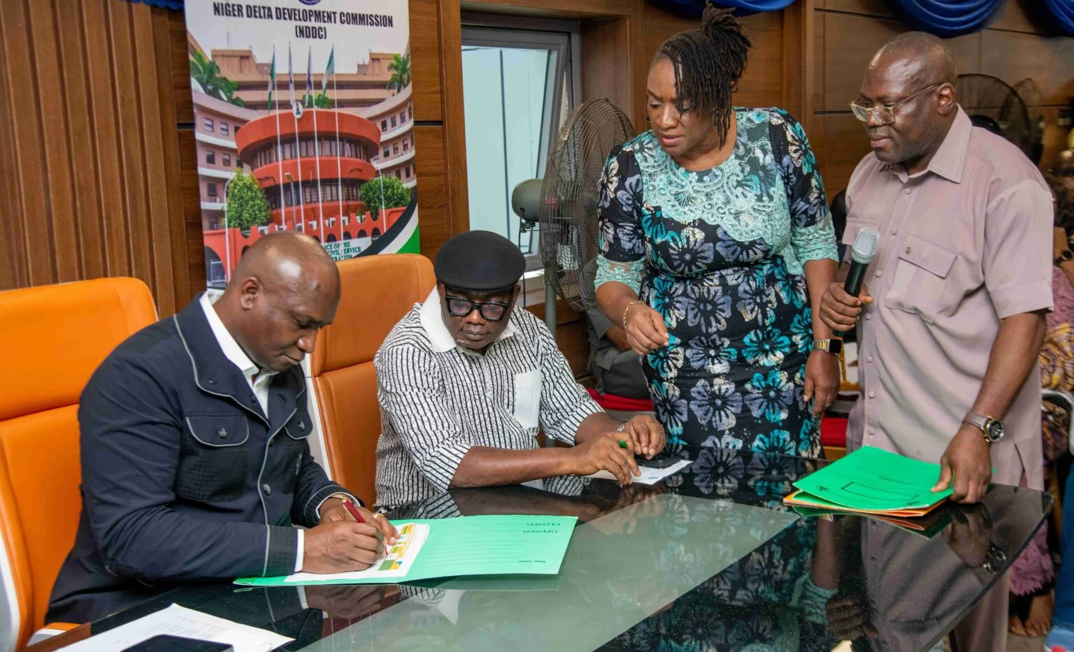 Ogbuku-signs-PMS-Implementation-Bond-1536×933